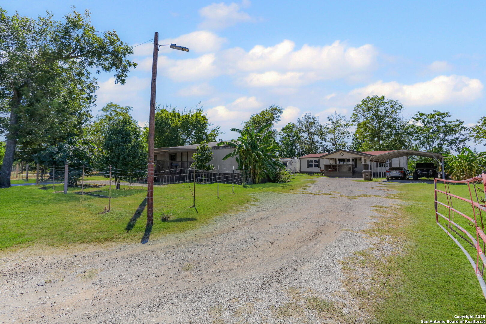 12925 Luckey Road Atascosa, TX 78002 - Photo 4 of 50 a view of a park with swings