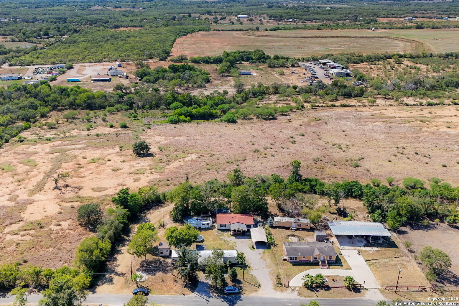12925 Luckey Road Atascosa, TX 78002 - Photo 44 of 50 a view of a lake with beach