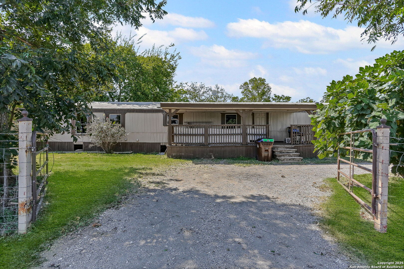 12925 Luckey Road Atascosa, TX 78002 - Photo 6 of 50 a view of a house with backyard and sitting area