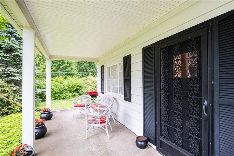 3666 Sandy Hill Road Gibsonia, PA 15044 - Photo 22 of 23 Greet the day from this beautiful front covered patio. Sip your coffee, and look out over....