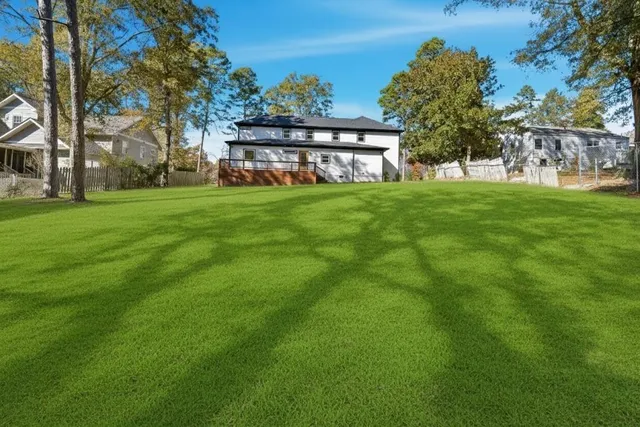 a front view of house with yard