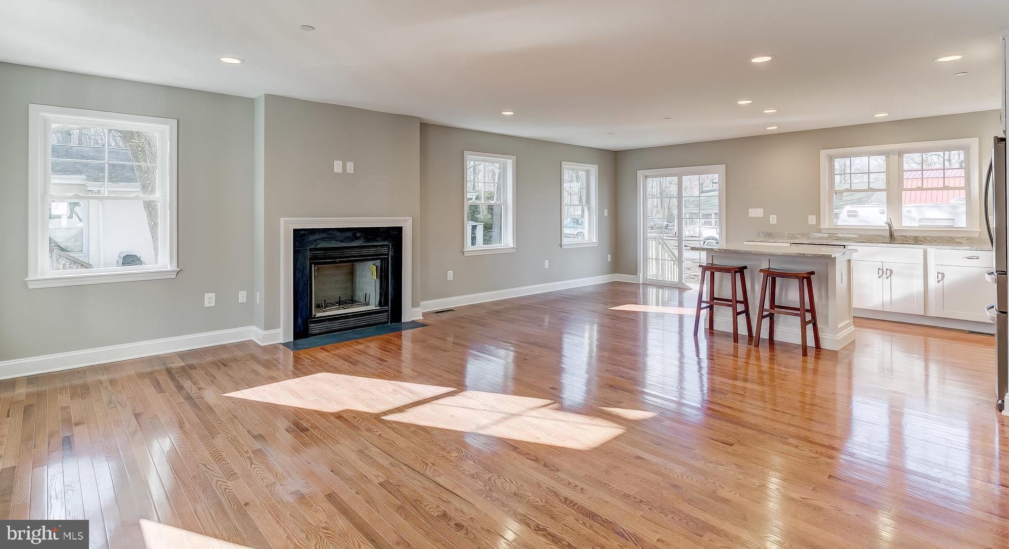 704 Tyler Point Road Deale, MD 20751 - Photo 8 of 22 Living room fire place