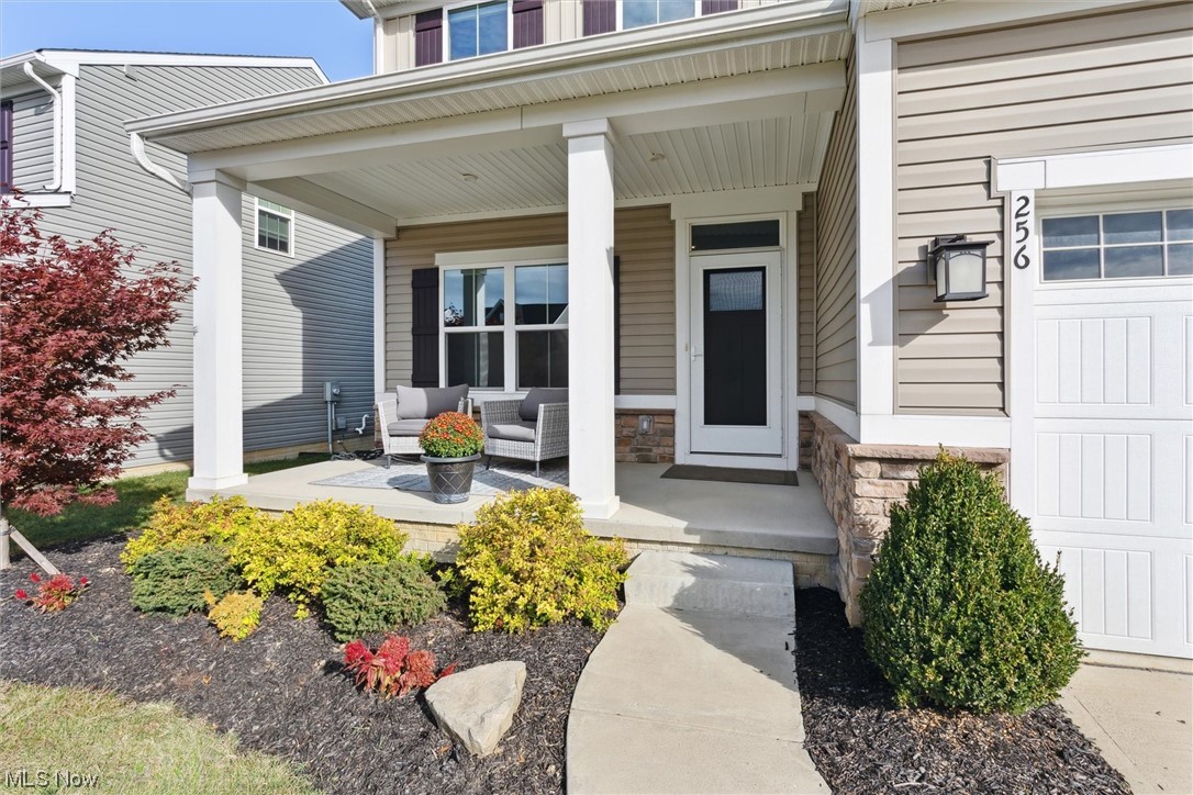 Entrance to property with a porch