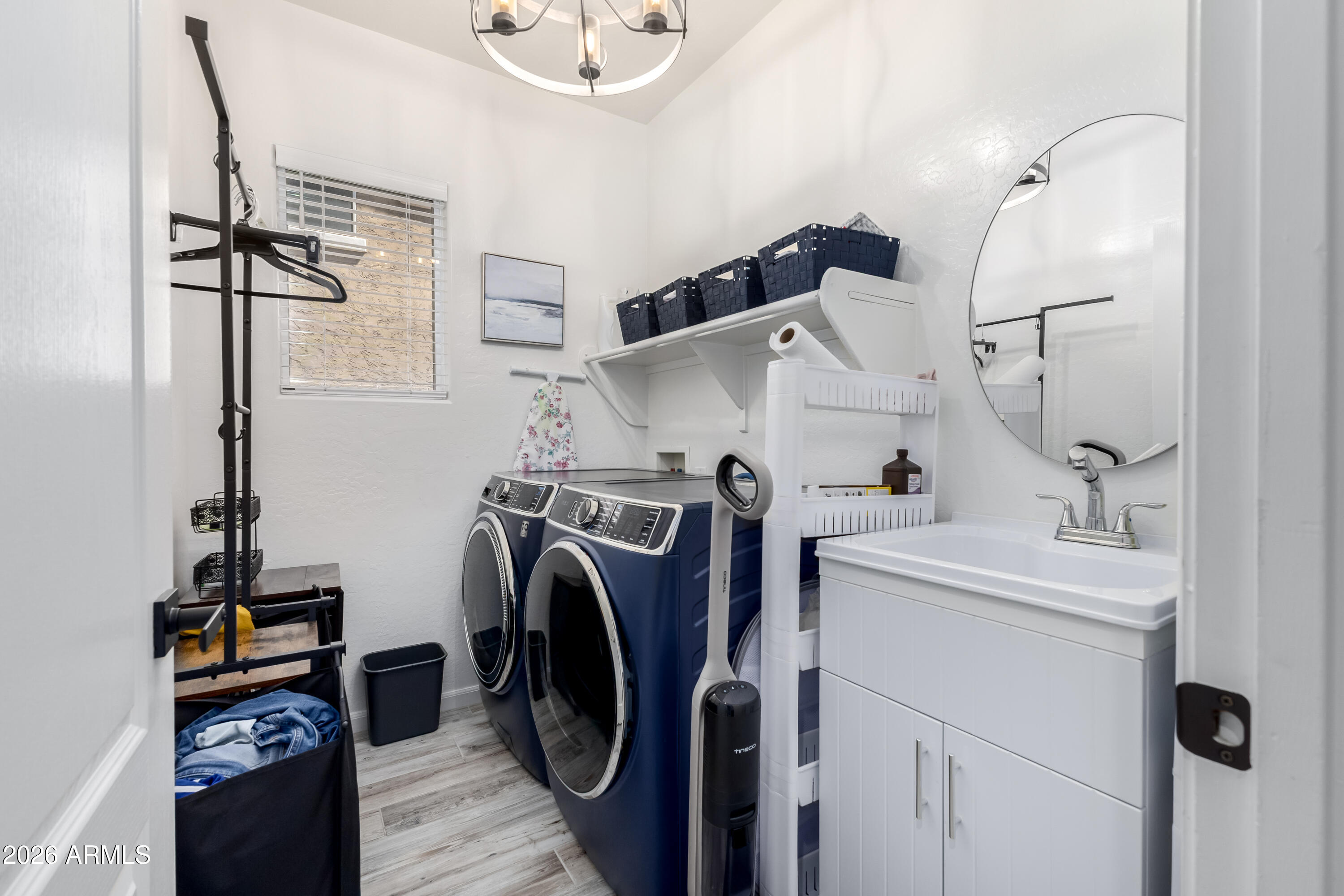 3256 East Geronimo Court Gilbert, AZ 85295 - Photo 33 of 53 a view of storage and utility room with washer and dryer