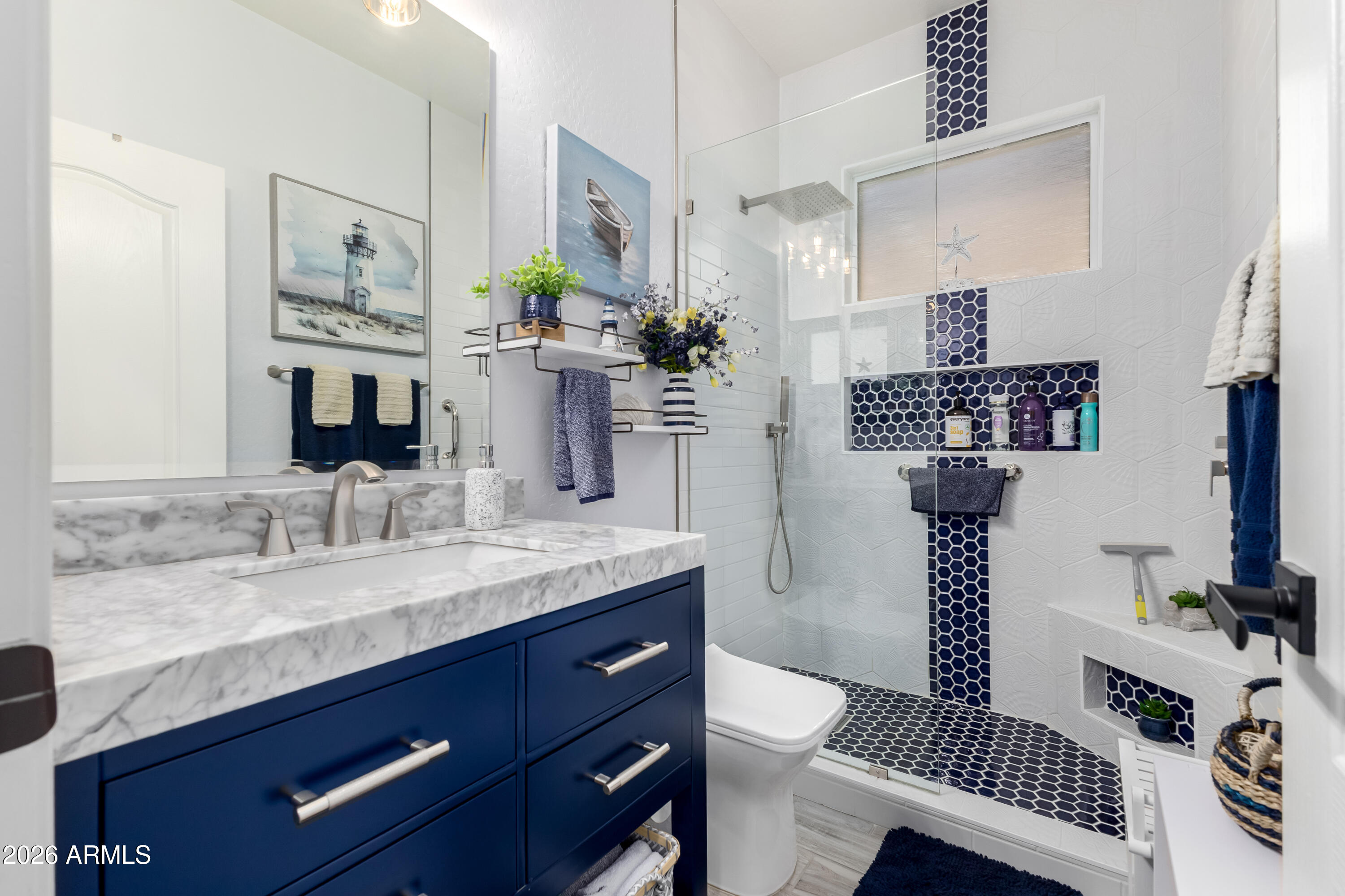 3256 East Geronimo Court Gilbert, AZ 85295 - Photo 34 of 53 a bathroom with a granite countertop sink and a mirror