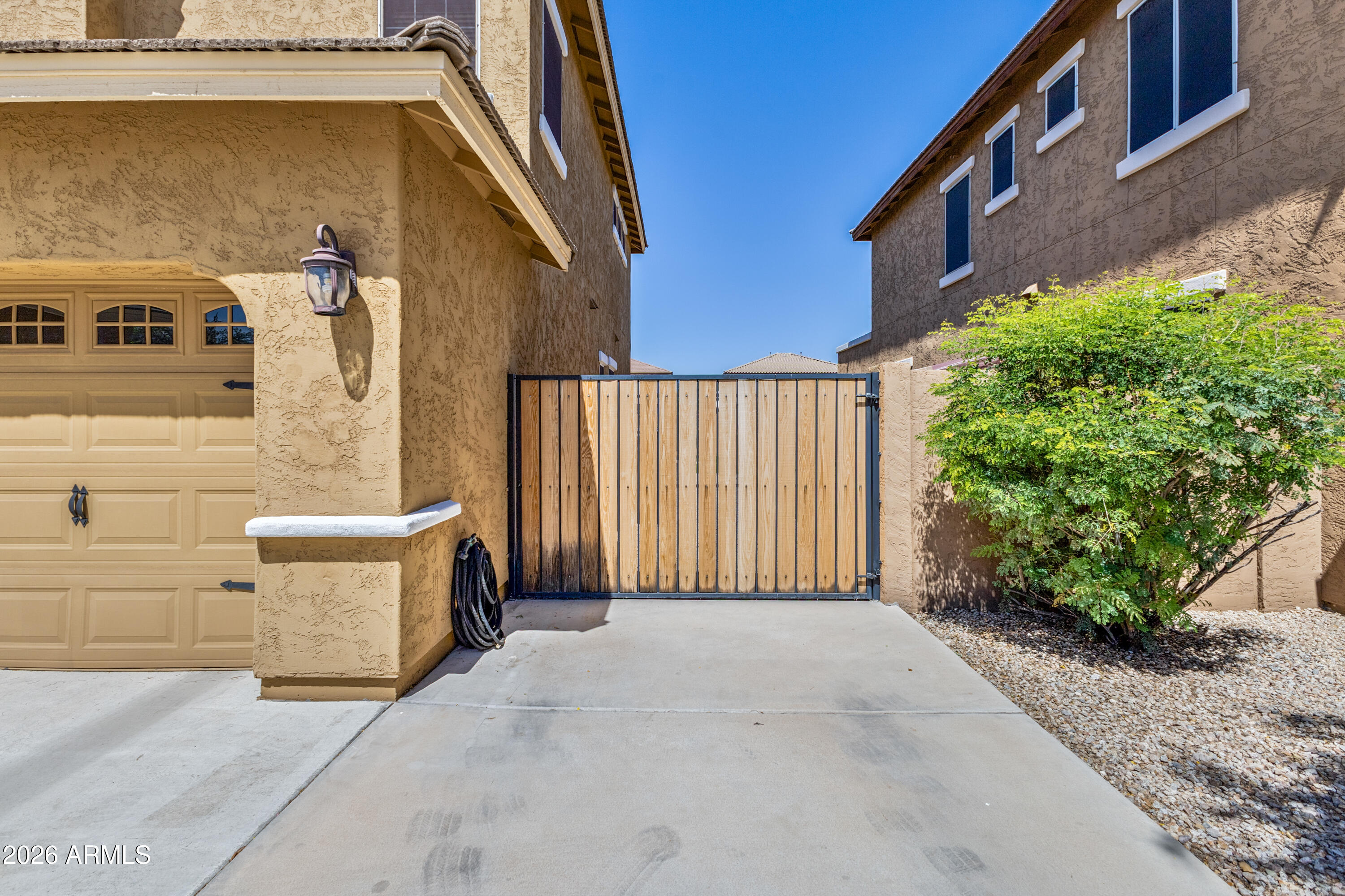 3256 East Geronimo Court Gilbert, AZ 85295 - Photo 4 of 53 a view of a building with entryway and a street