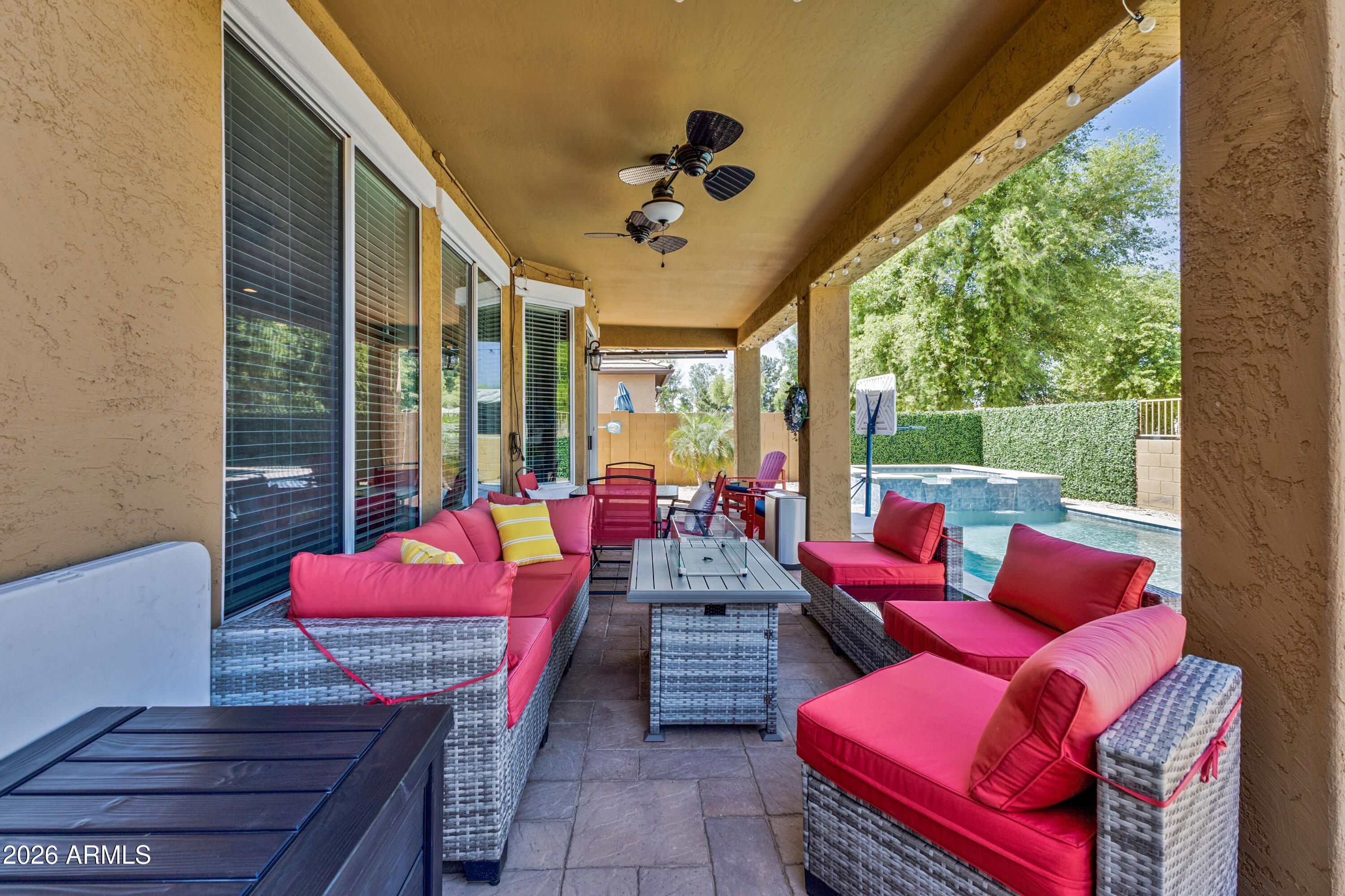 3256 East Geronimo Court Gilbert, AZ 85295 - Photo 8 of 53 a outdoor space with patio the couches and a potted plant