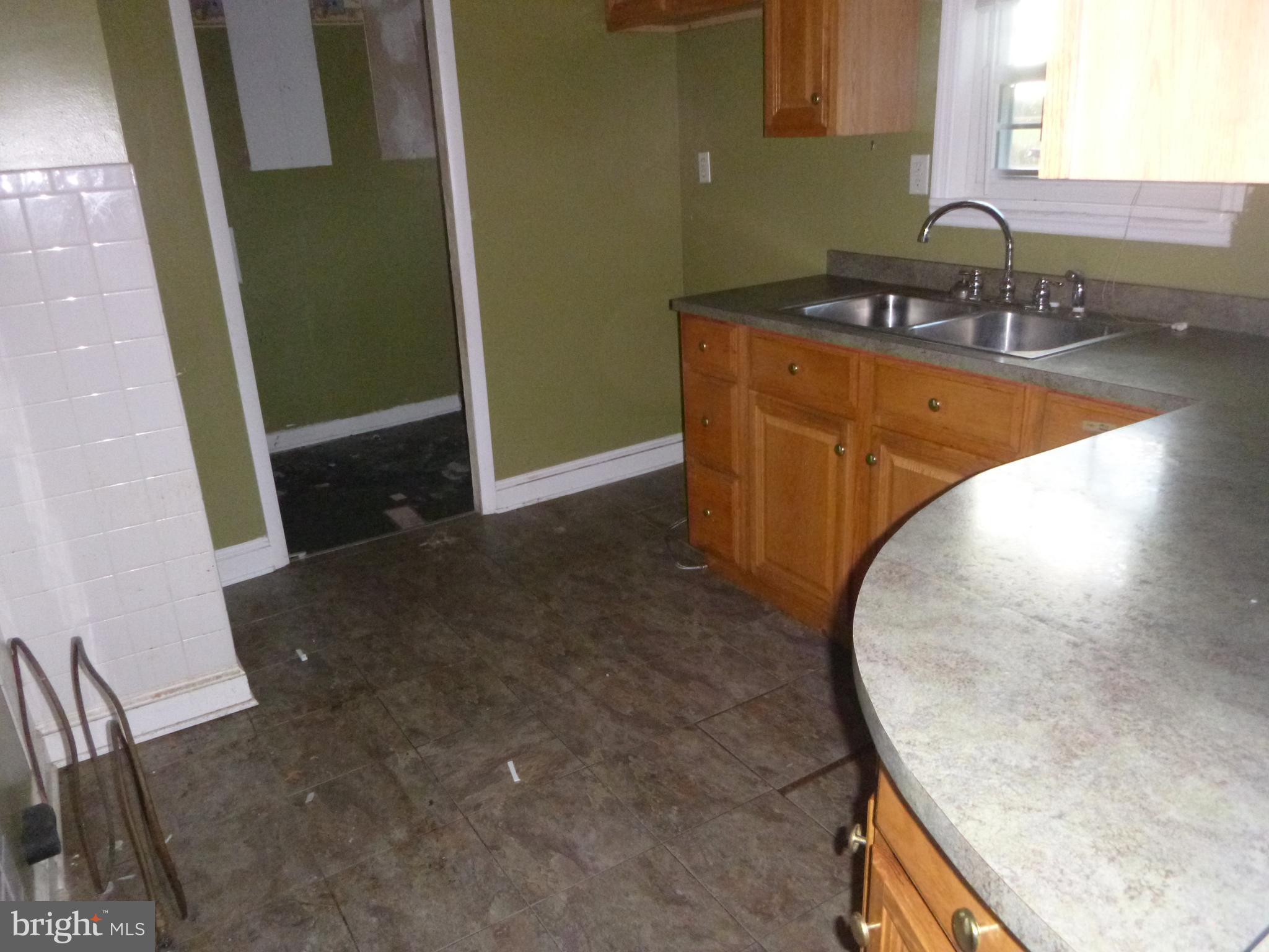 4669 Gadow Road Preston, MD 21655 - Photo 3 of 7 a view of a kitchen with sink