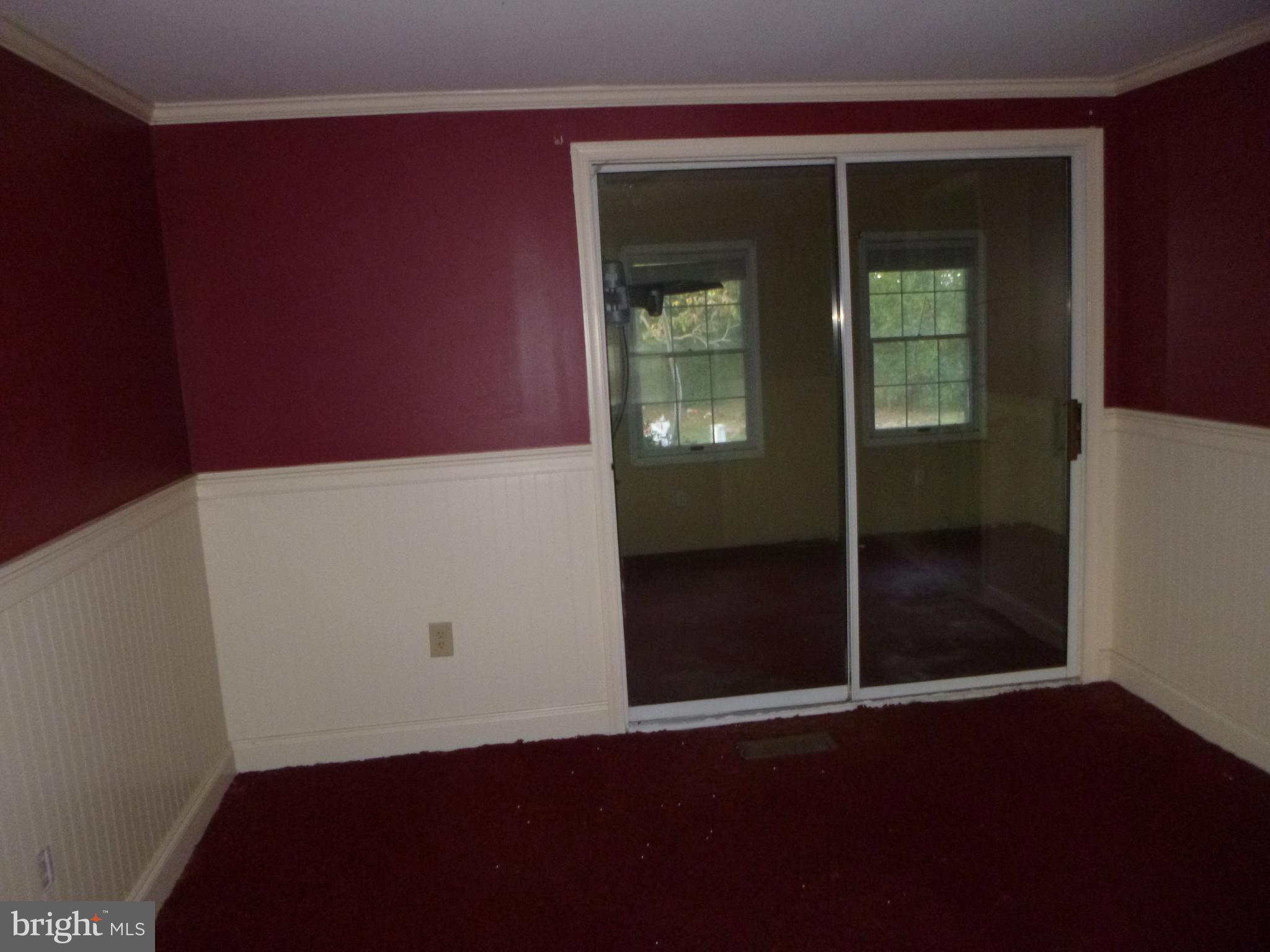 4669 Gadow Road Preston, MD 21655 - Photo 4 of 7 an empty room with window