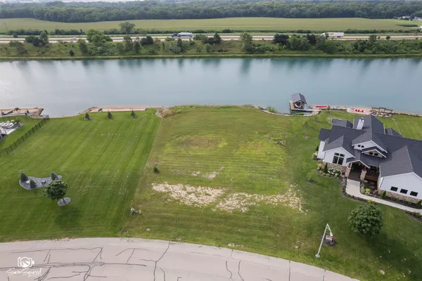 a view of a lake with a houses