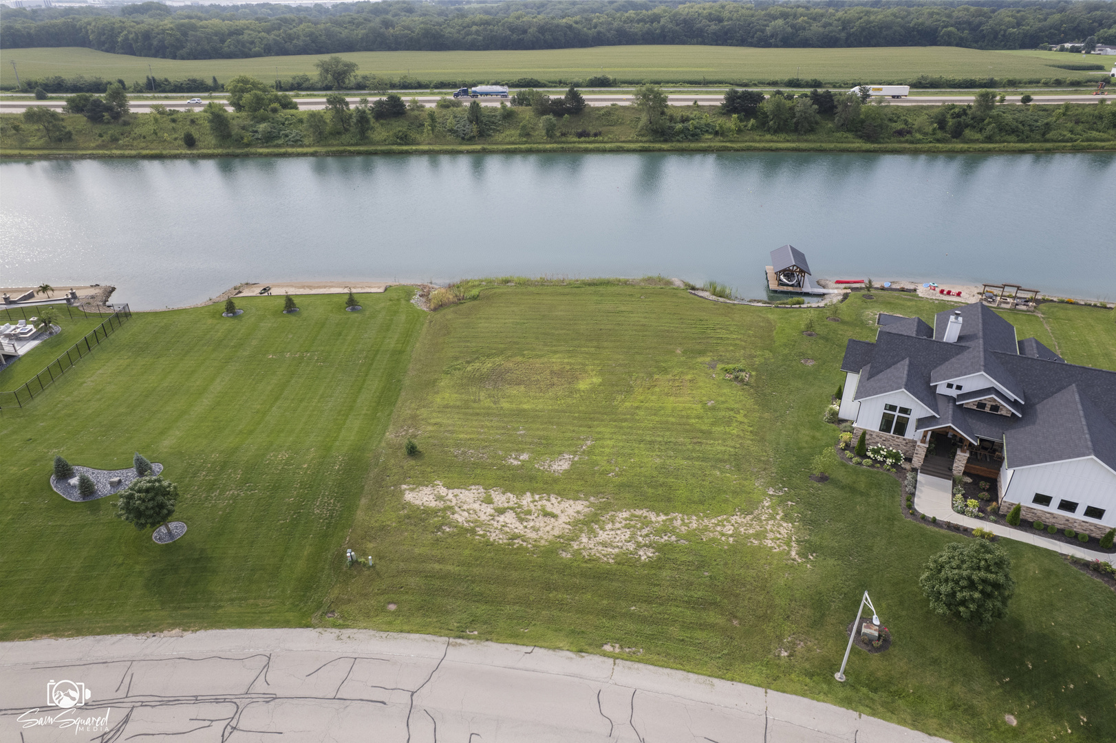 a view of a lake with a houses