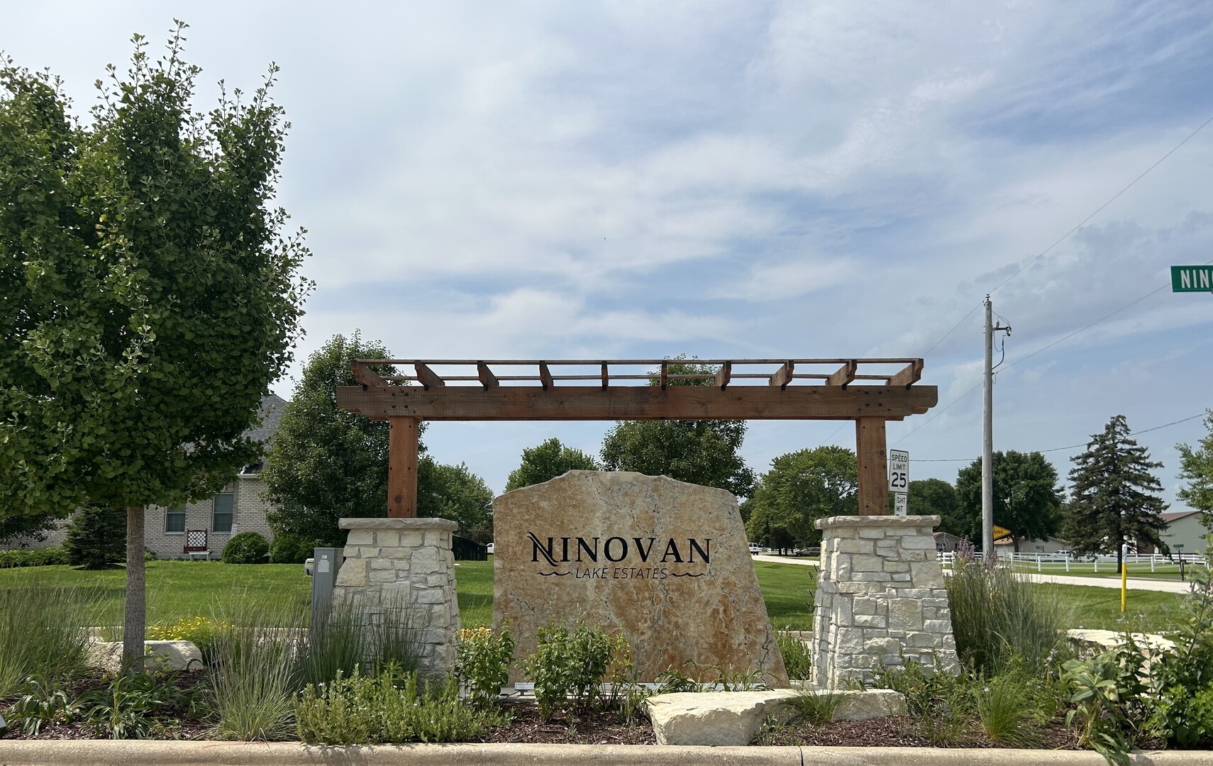 2812 Ninovan Lane Minooka, IL 60447 - Photo 12 of 12 a view of a sign in front of a house with a big yard