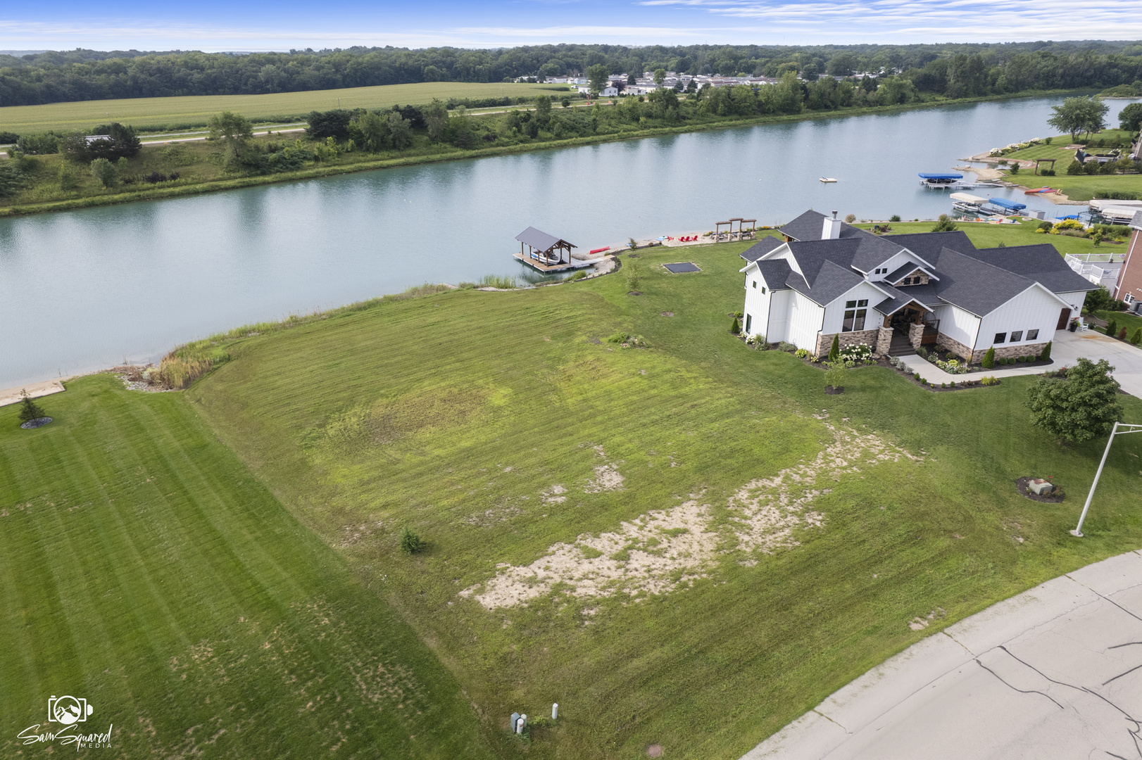 2812 Ninovan Lane Minooka, IL 60447 - Photo 2 of 12 a view of a lake with a mountain in the background