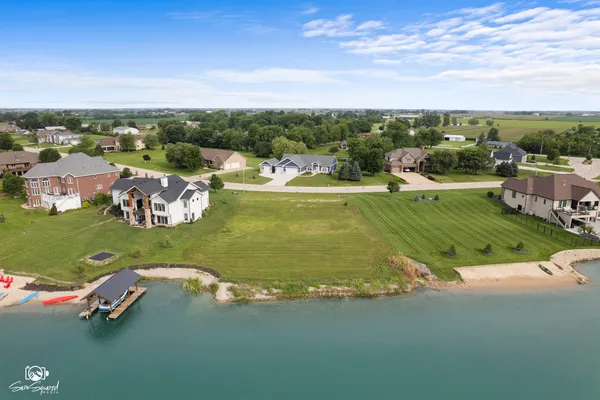 a view of a lake with houses