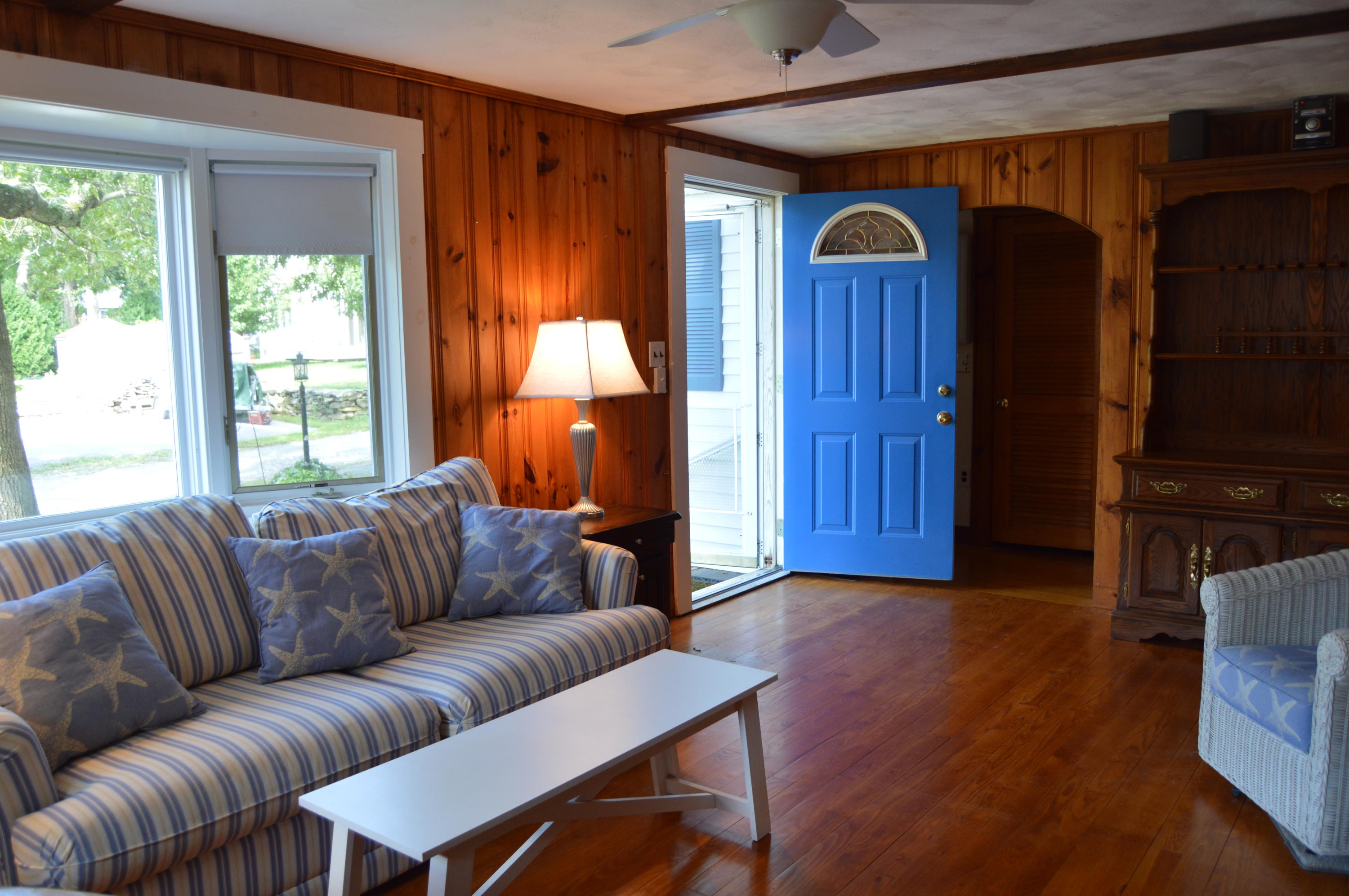 8 Wianno Road Marion, MA 02738 - Photo 6 of 14 a living room with a couch and a window
