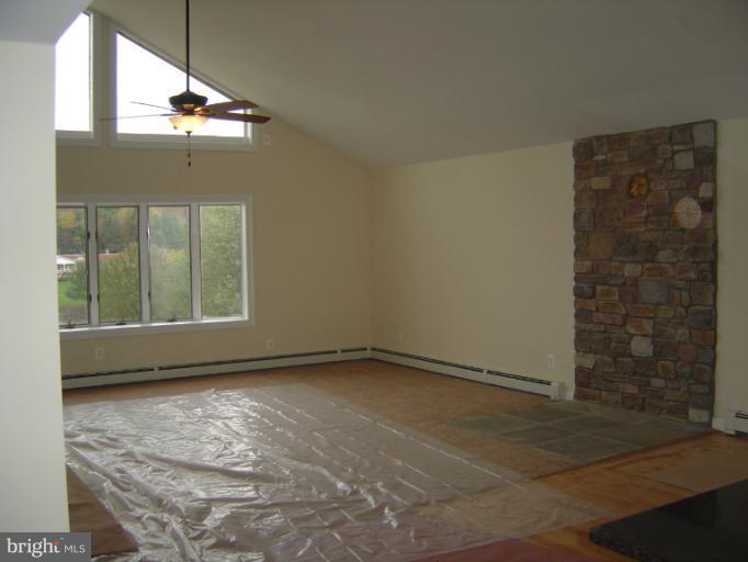 18002 Marshall Mill Road Hampstead, MD 21074 - Photo 23 of 30 a view of an empty room with a window
