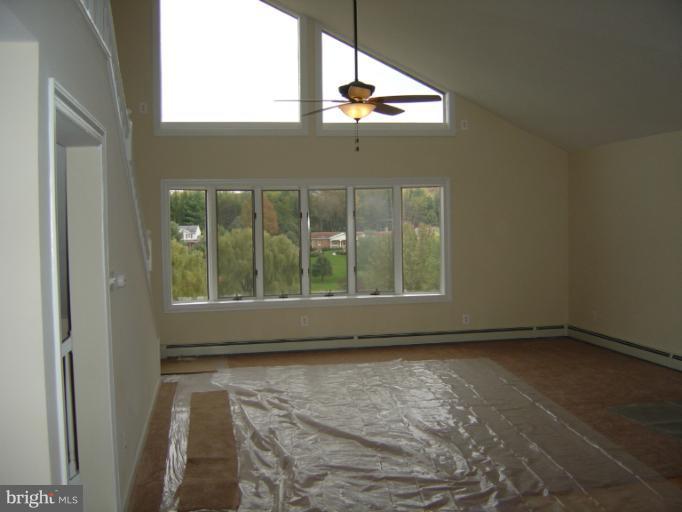 18002 Marshall Mill Road Hampstead, MD 21074 - Photo 28 of 30 a view of an empty room with a window