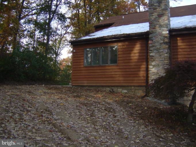 18002 Marshall Mill Road Hampstead, MD 21074 - Photo 29 of 30 a view of a house with a yard