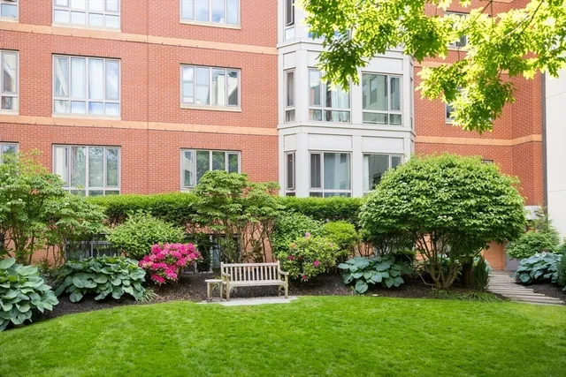 a view of a back yard of the house and a garden