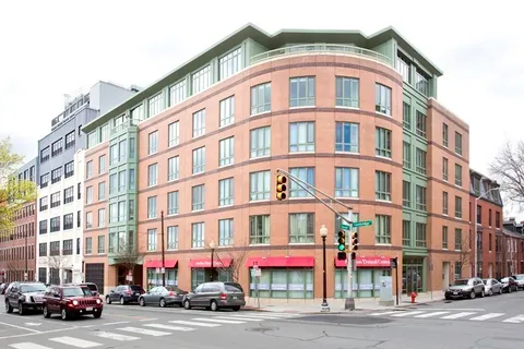a front view of a building with a glass door