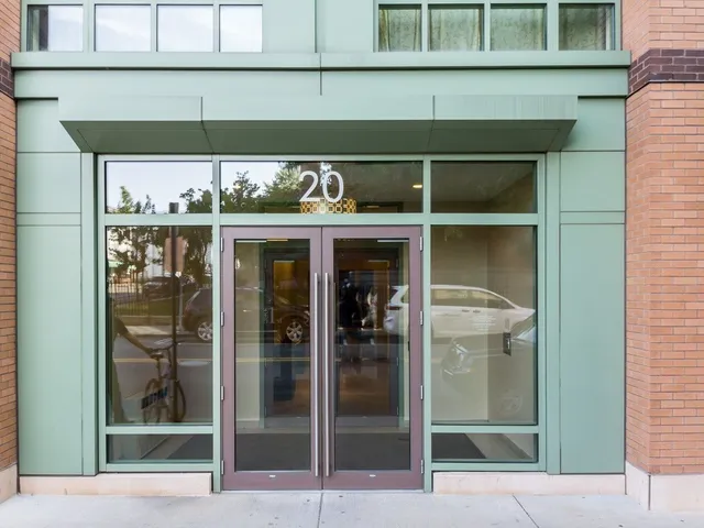 a bedroom with furniture and a rug