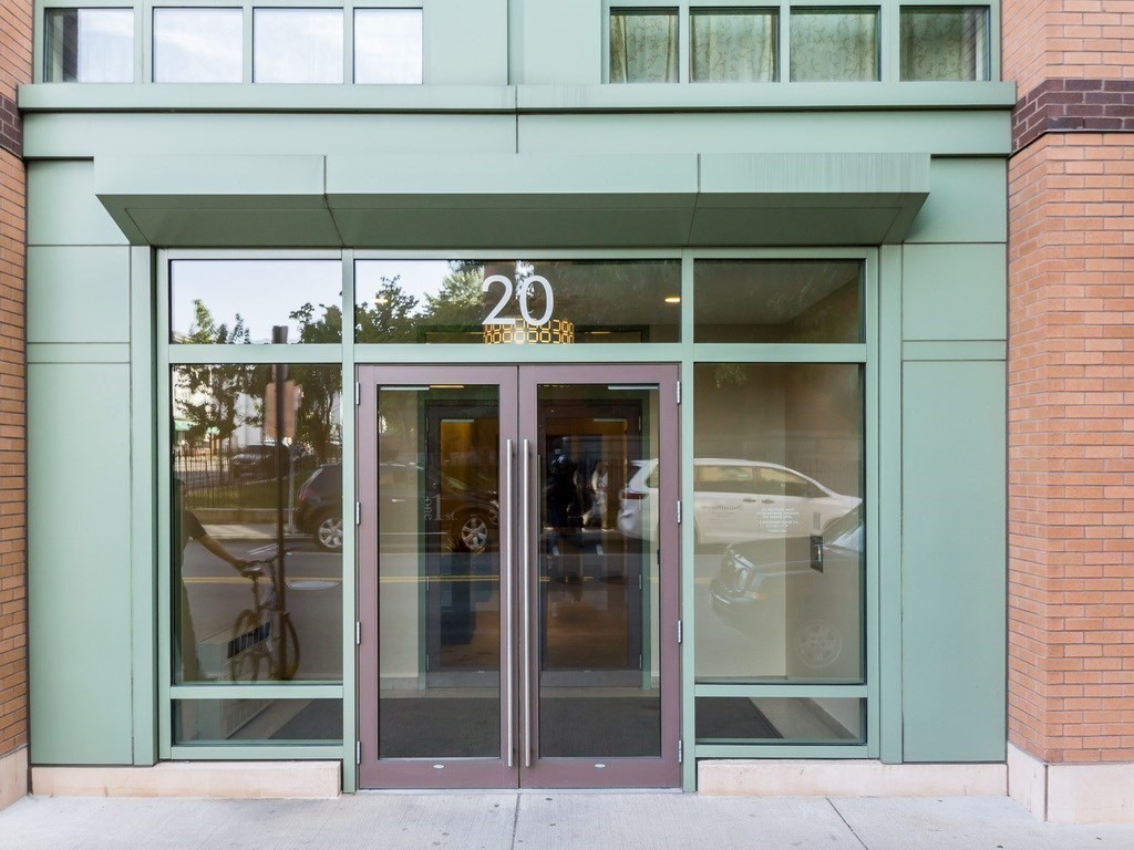 20 Second Street, Unit 222 Cambridge, MA 02141 - Photo 35 of 38 a front view of a building with a glass door