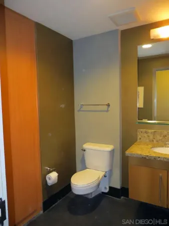 a bathroom with a toilet and a sink