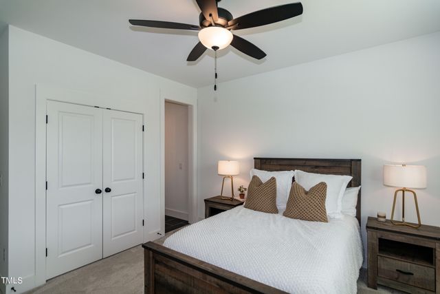 a kitchen with stainless steel appliances granite countertop a sink a stove oven a counter space and cabinets