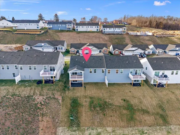 a aerial view of a house with lake view