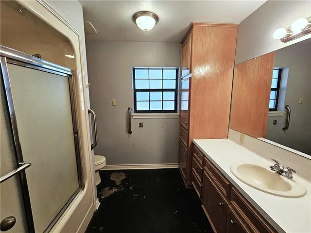 a kitchen with granite countertop cabinets and a sink