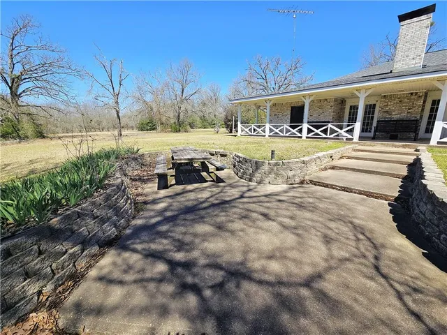 a view of front door and yard