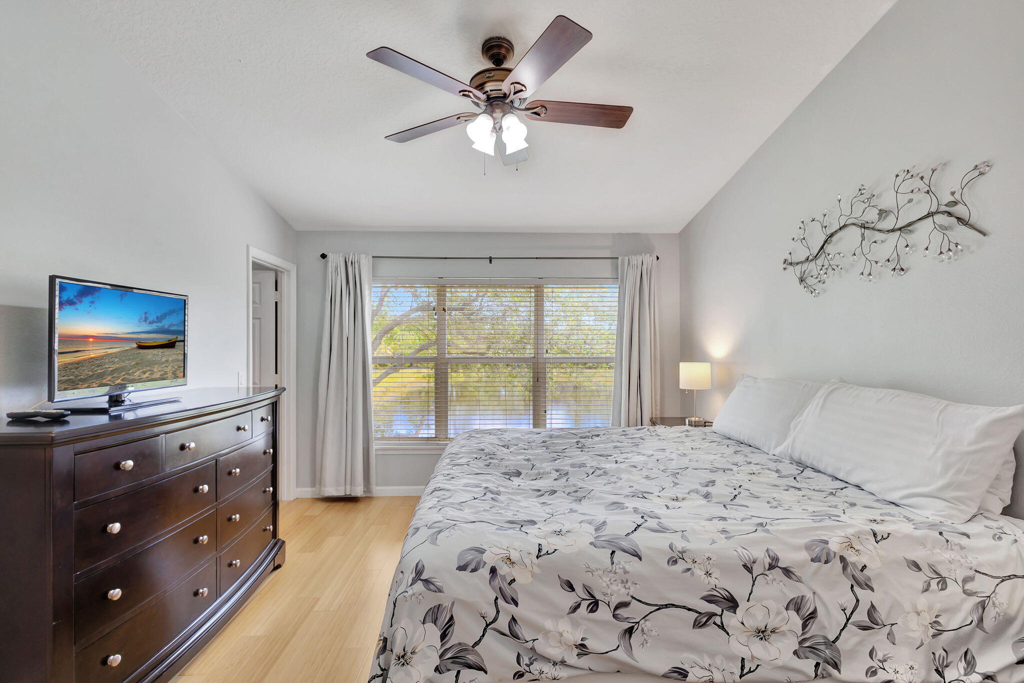 1103 Woodfield Road Greenacres, FL 33415 - Photo 17 of 44 Primary bedroom w lake view