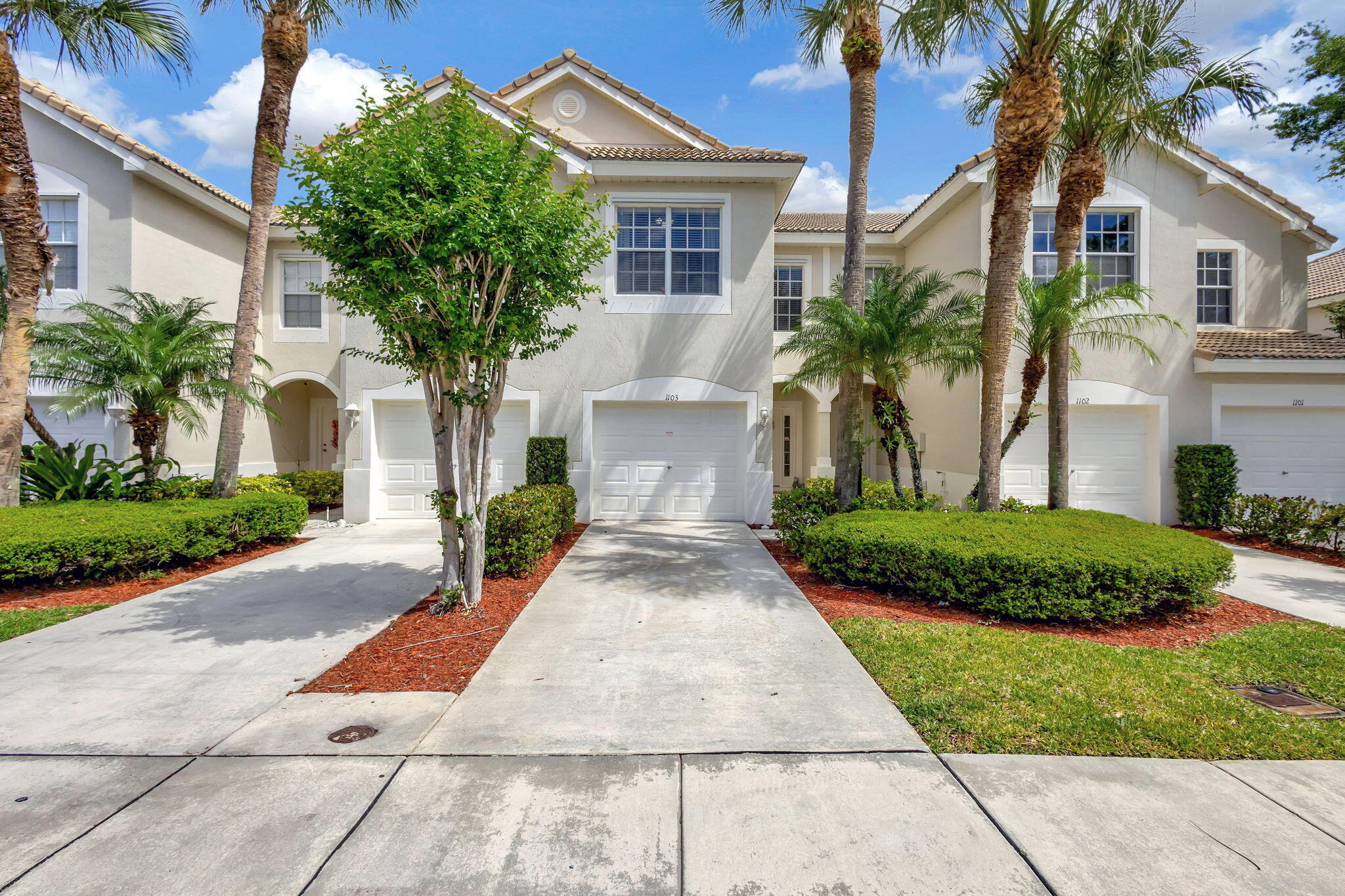 1103 Woodfield Road Greenacres, FL 33415 - Photo 2 of 44 Front elevation