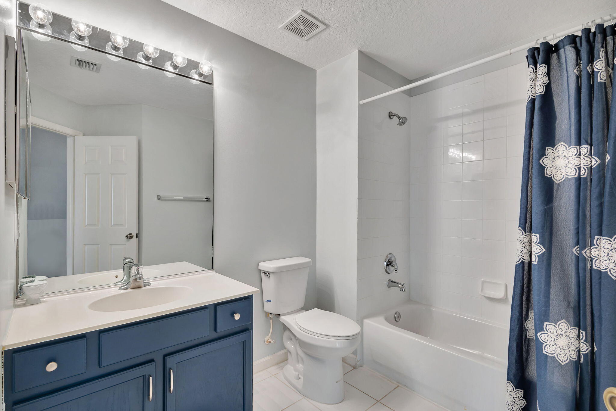 1103 Woodfield Road Greenacres, FL 33415 - Photo 24 of 44 Guest bathroom