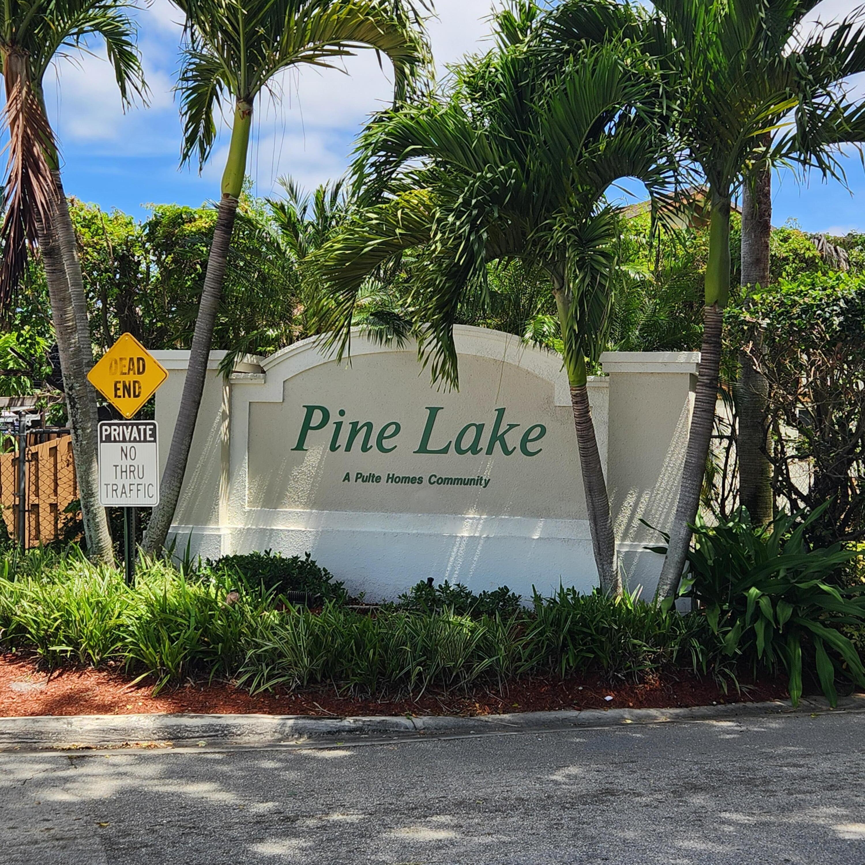 1103 Woodfield Road Greenacres, FL 33415 - Photo 34 of 44 Entrance sign