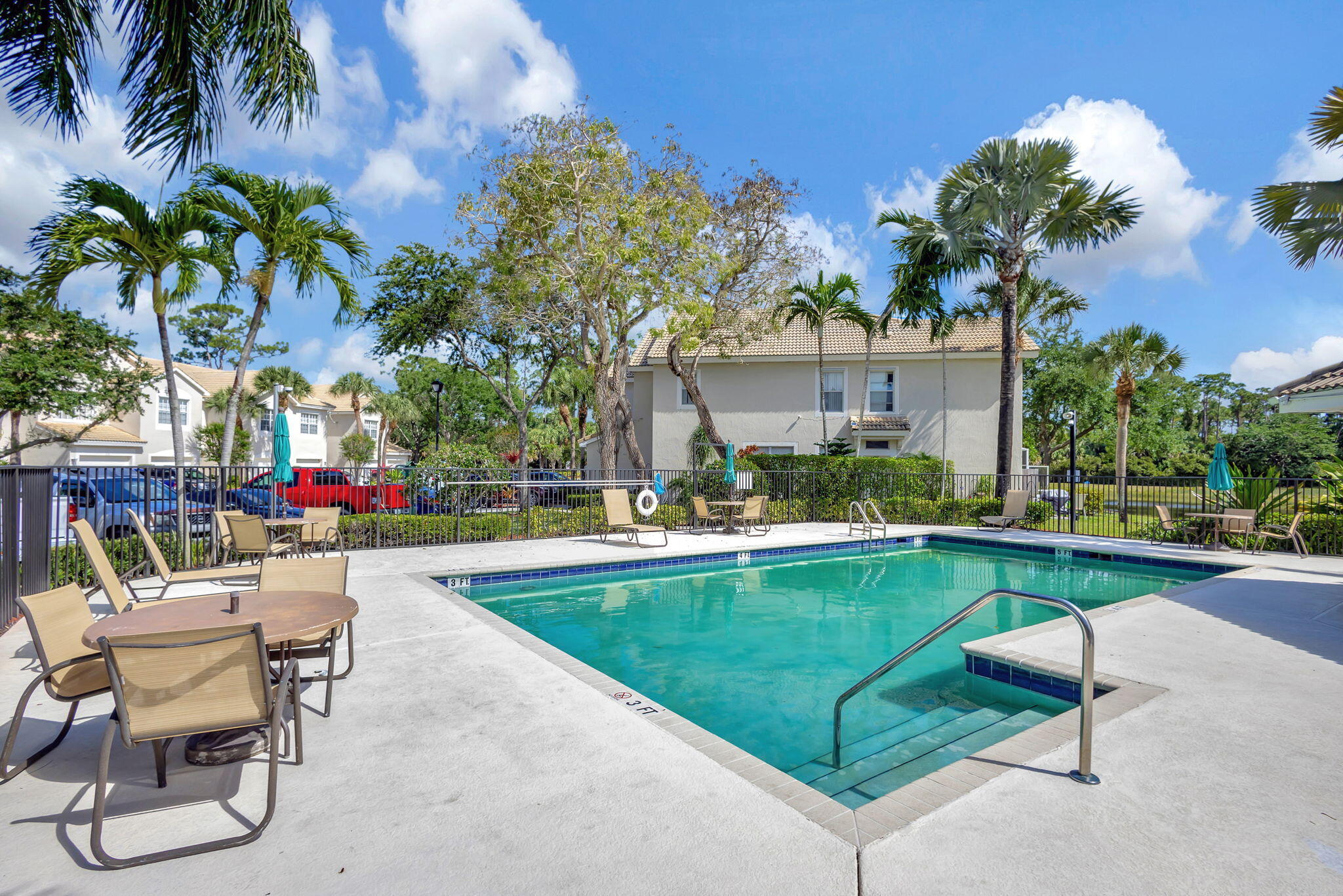 1103 Woodfield Road Greenacres, FL 33415 - Photo 37 of 44 Community pool