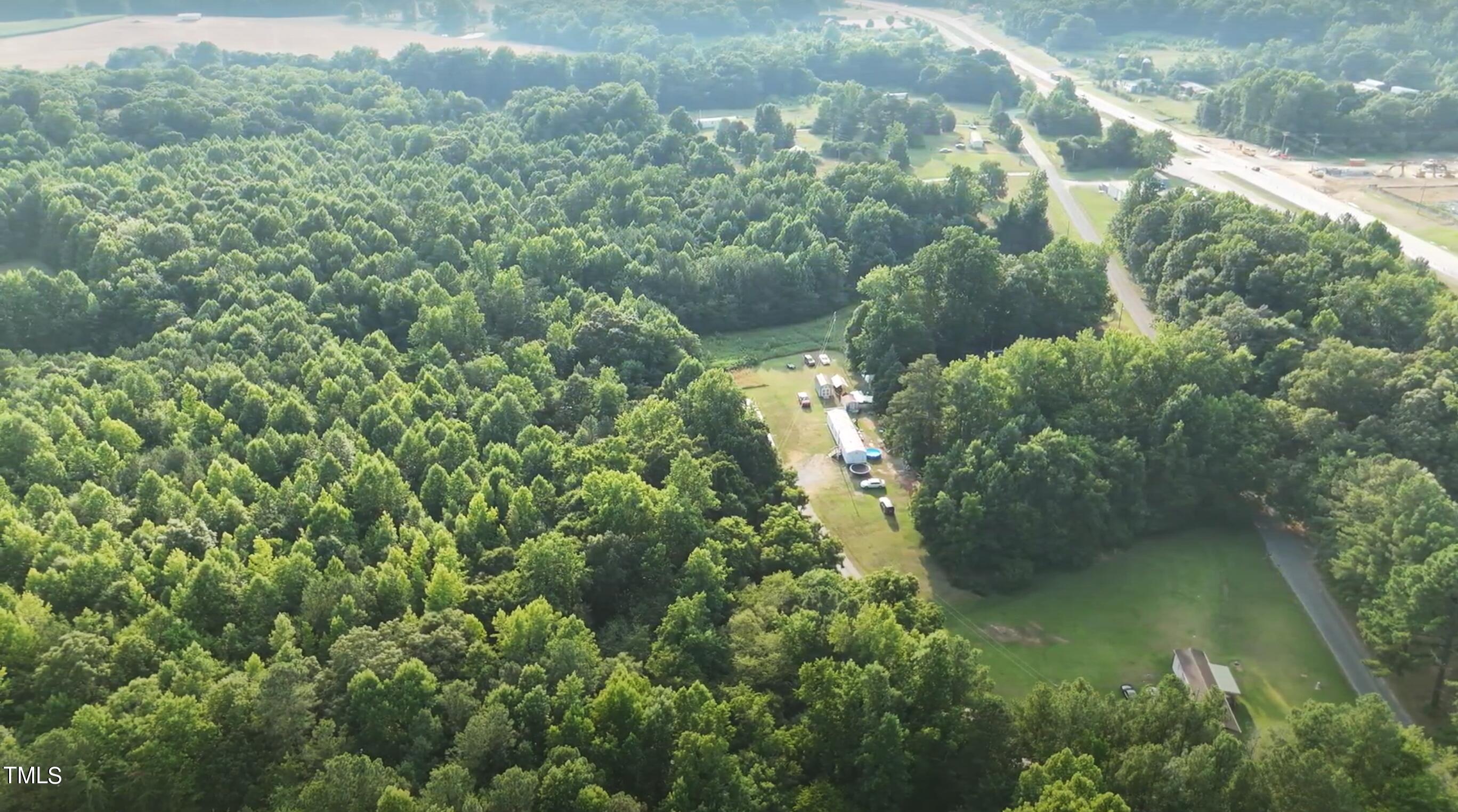 505 Graham Moore Road Staley, NC 27355 - Photo 3 of 12 a view of a garden