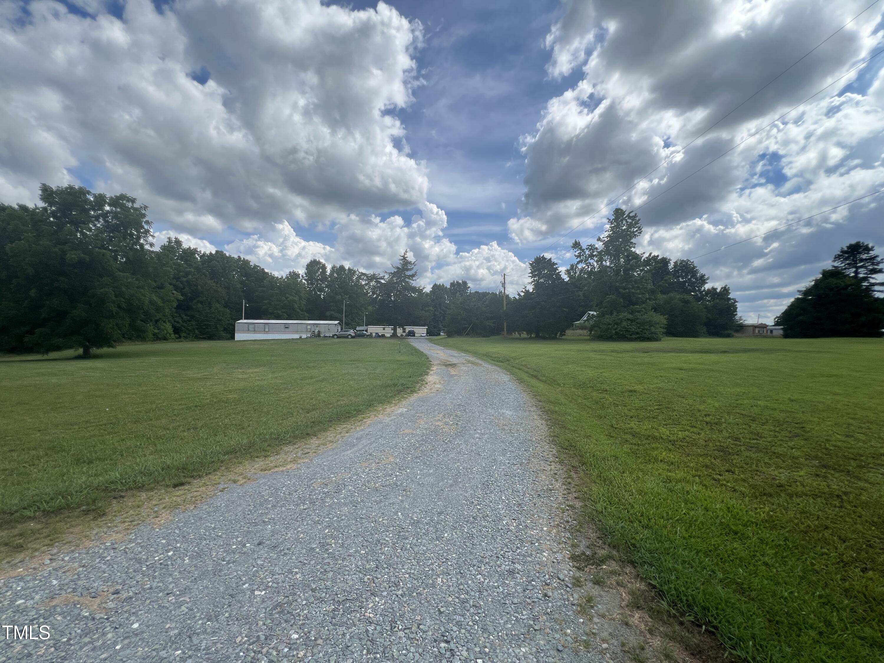 505 Graham Moore Road Staley, NC 27355 - Photo 8 of 12 a view of a golf course with swimming pool