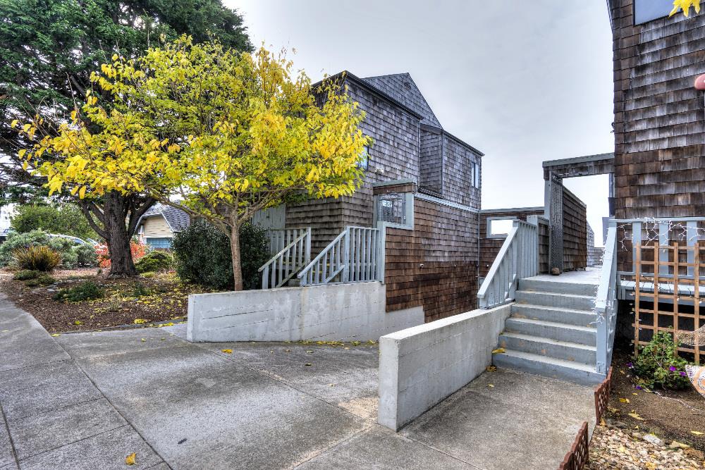 534 Monterey Road Pacifica, CA 94044 - Photo 20 of 20 a view of house with wooden stairs and a small yard