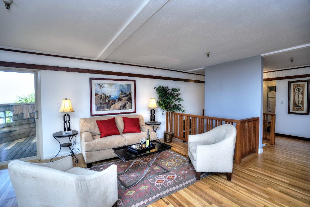 534 Monterey Road Pacifica, CA 94044 - Photo 4 of 20 a living room with furniture and wooden floor