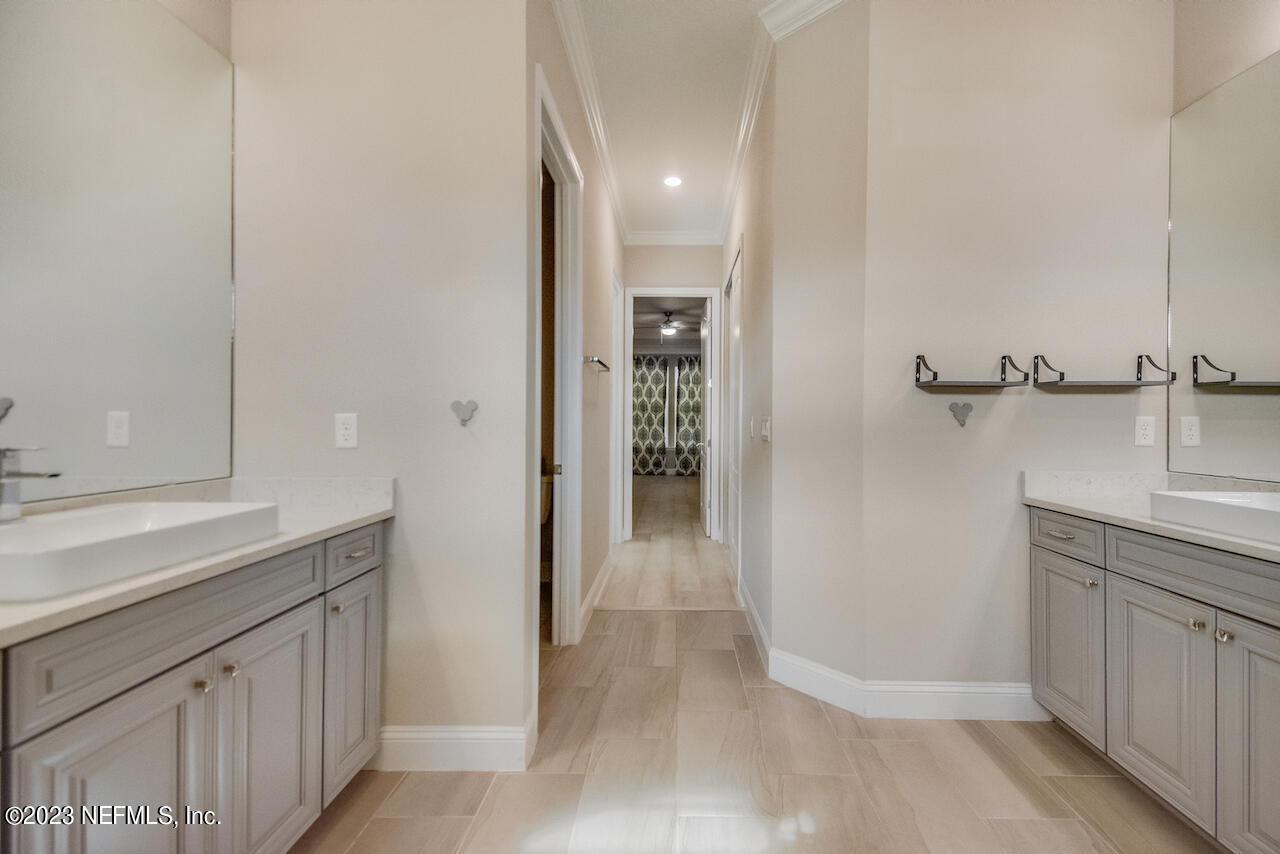 233 Aspinwall Parkway St. Augustine, FL 32095 - Photo 13 of 31 a view of a bathroom from the hallway