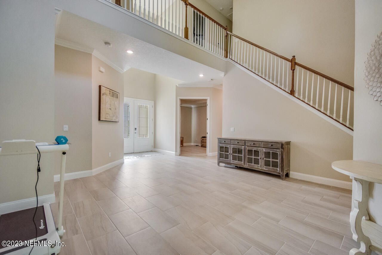 233 Aspinwall Parkway St. Augustine, FL 32095 - Photo 15 of 31 a view of an entryway with wooden floor