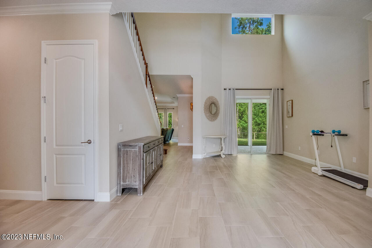 233 Aspinwall Parkway St. Augustine, FL 32095 - Photo 16 of 31 a view of an entryway with wooden floor