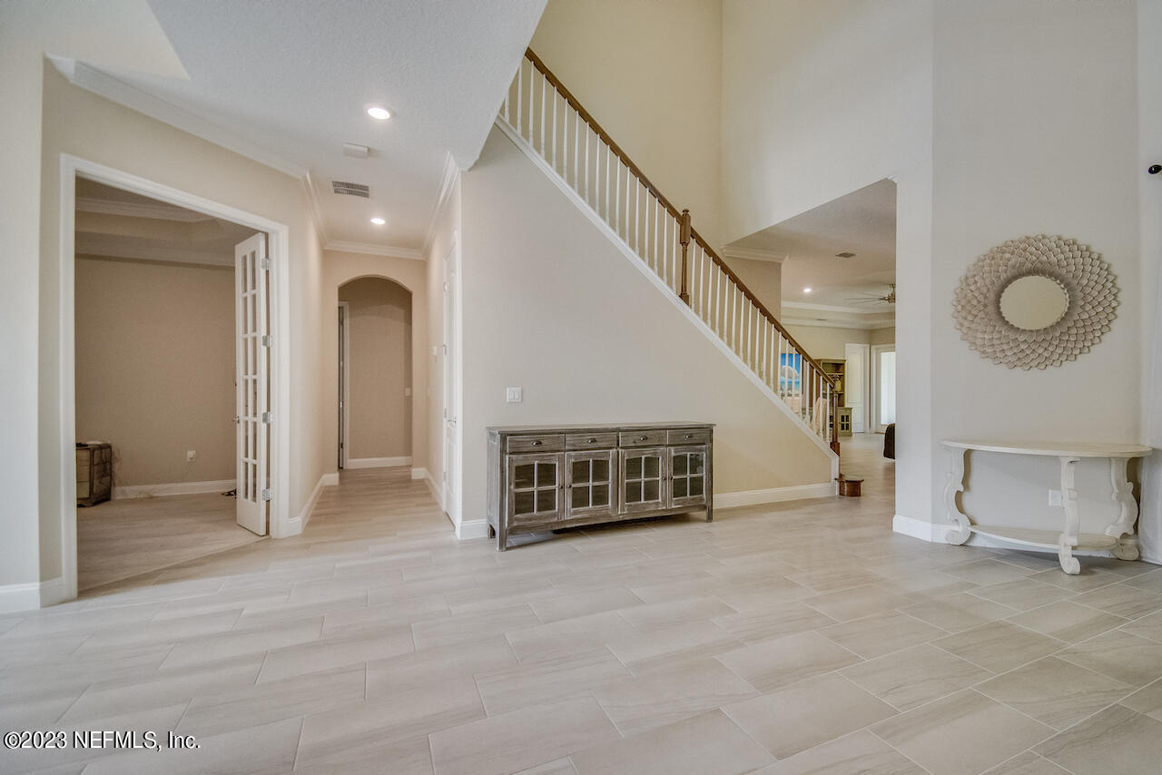 233 Aspinwall Parkway St. Augustine, FL 32095 - Photo 17 of 31 a view of an empty room with a fireplace