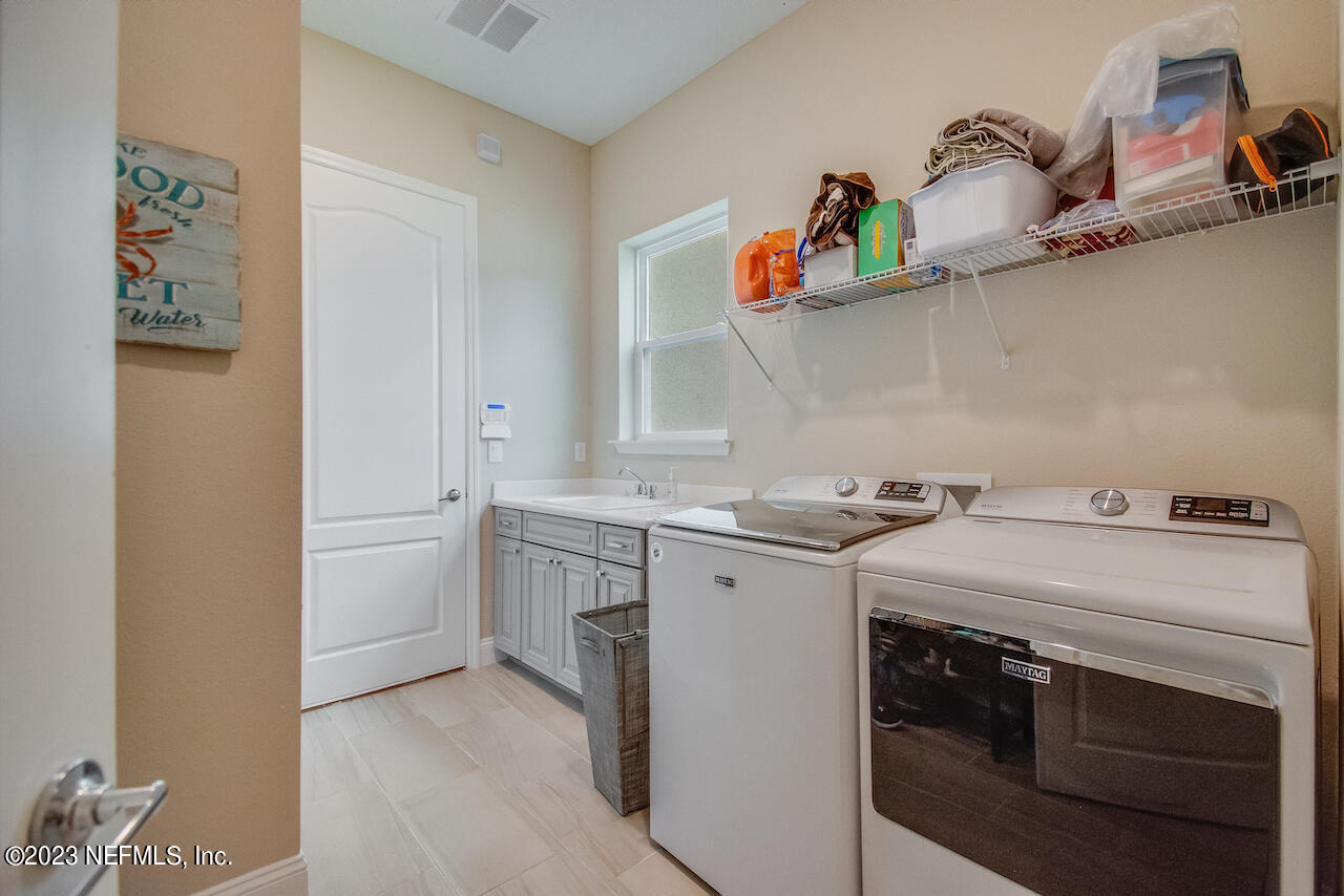 233 Aspinwall Parkway St. Augustine, FL 32095 - Photo 28 of 31 a utility room with dryer and washer