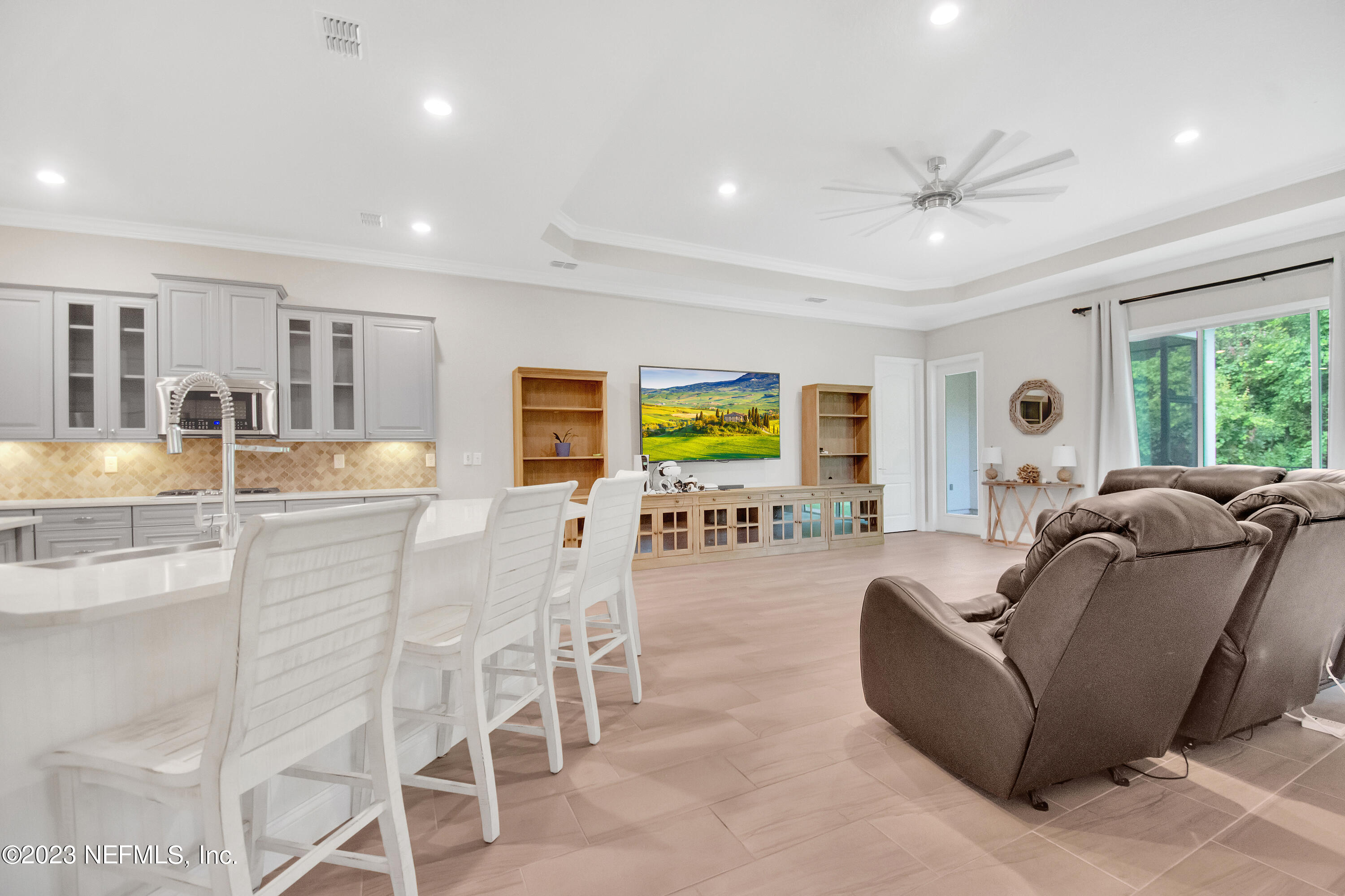 233 Aspinwall Parkway St. Augustine, FL 32095 - Photo 4 of 31 a living room with furniture and a large window