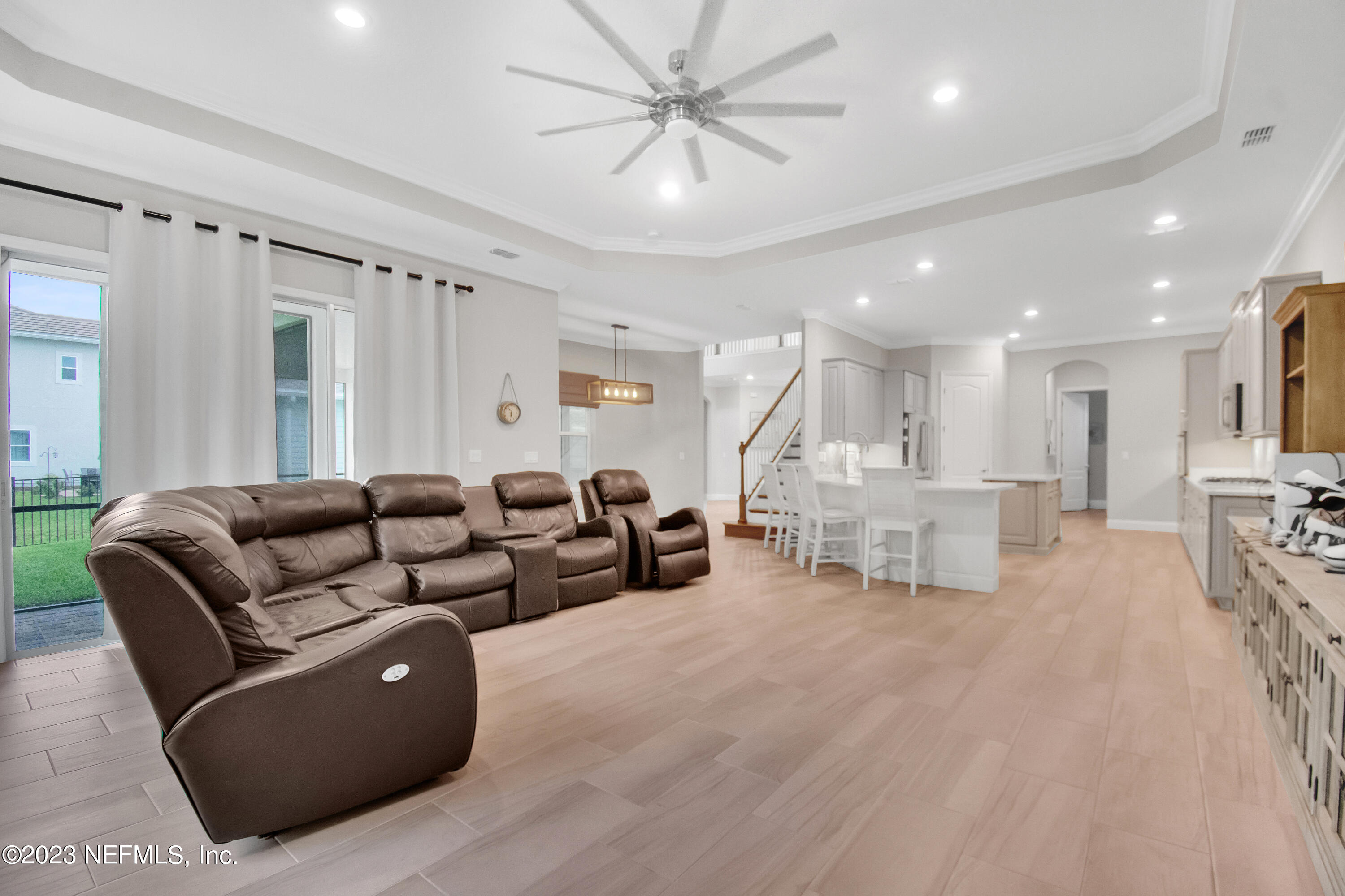 233 Aspinwall Parkway St. Augustine, FL 32095 - Photo 5 of 31 a living room with furniture and a large window