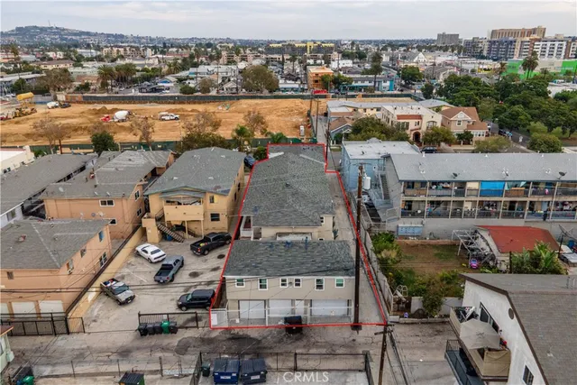 an aerial view of a house with a garden