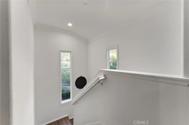 a bed room with a bed and a window