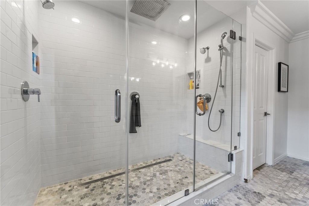 10 Bower Tree Irvine, CA 92603 - Photo 19 of 37 a bathroom with a shower